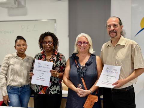 Deux enseignantes, la DDFPT et le directeur de l'IEDOM